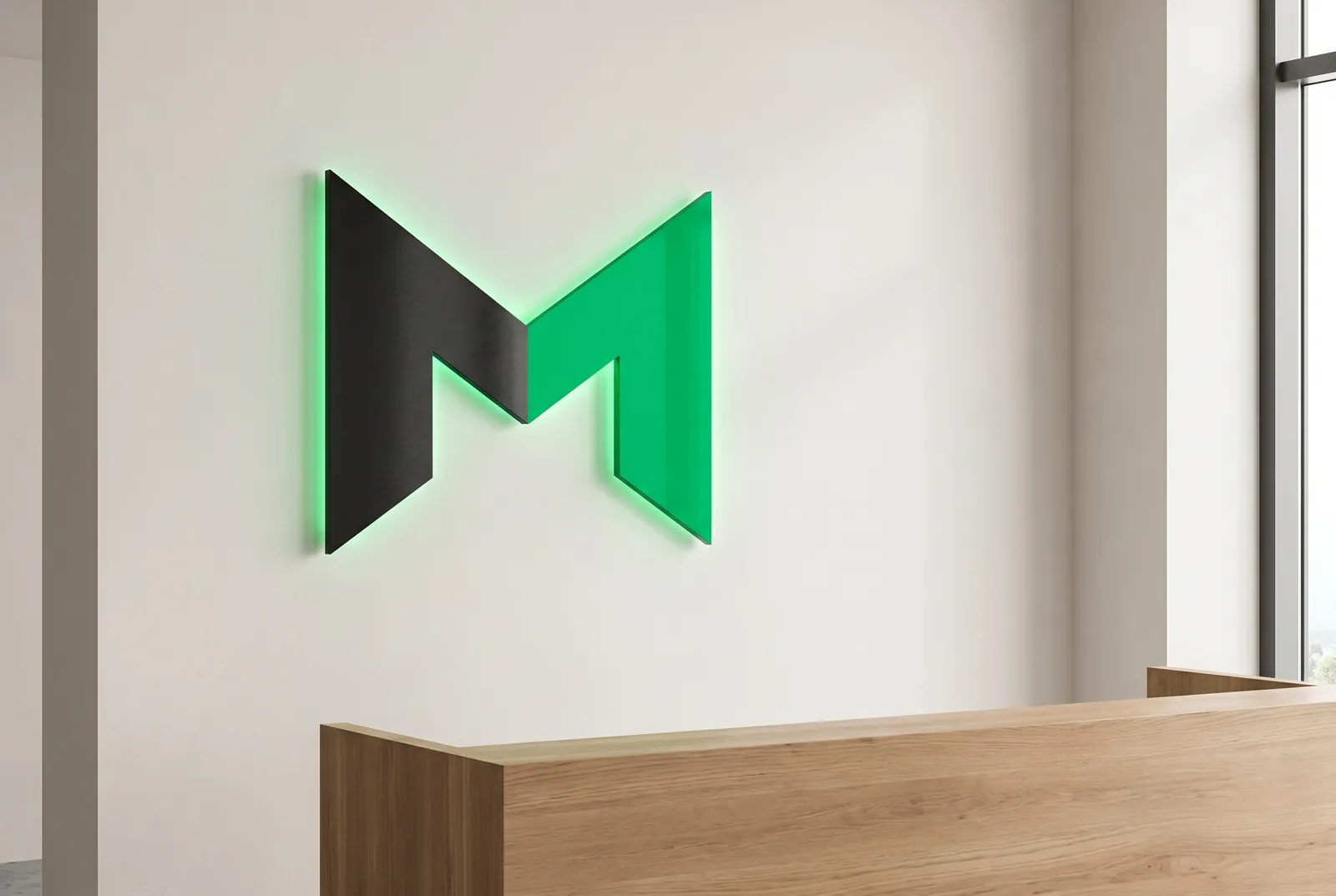 Backlit Surge M logo sign on a lobby wall